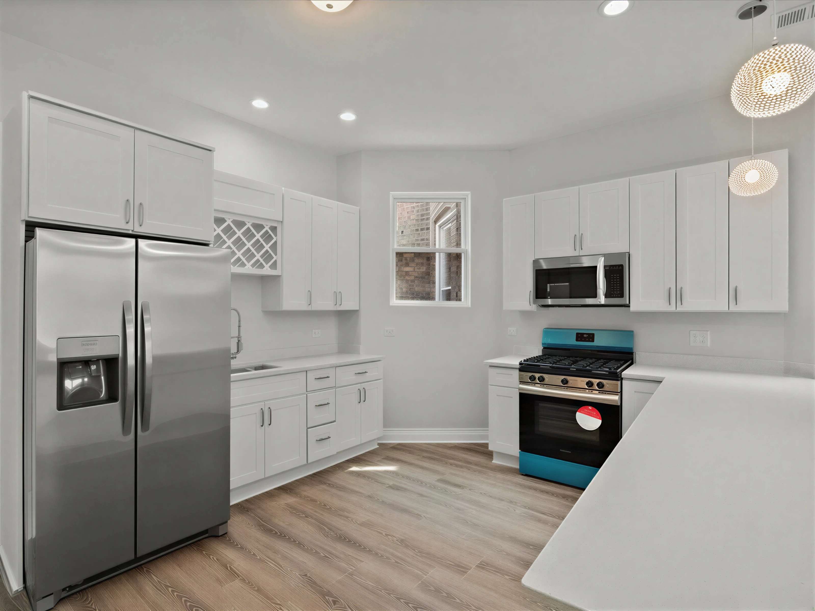 White shaker kitchen with quartz counters