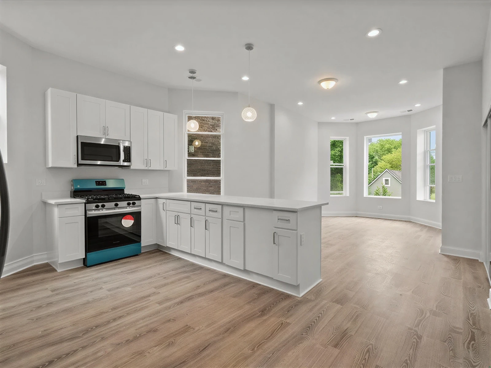 Open-concept kitchen in a renovated Englewood greystone two-flat