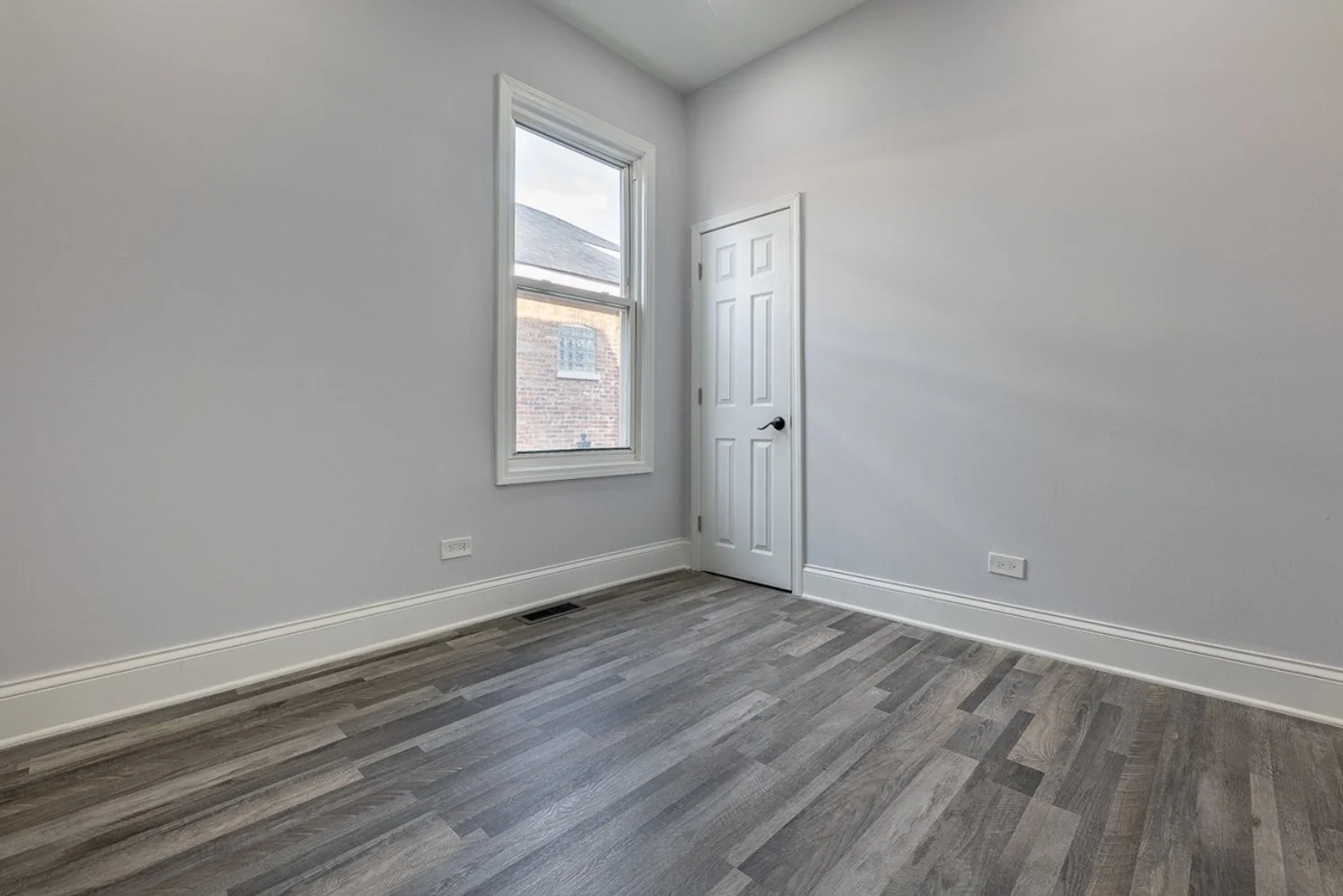 Renovated bedroom with natural light