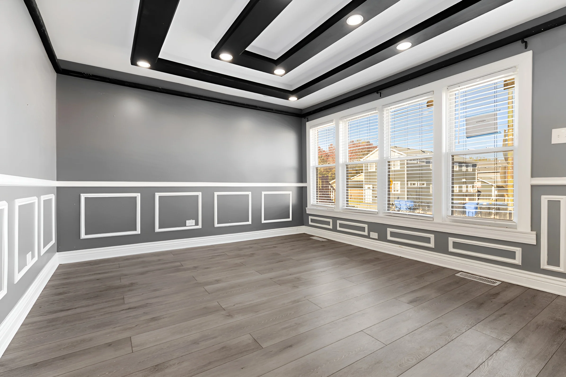 Bay-window living room filled with daylight